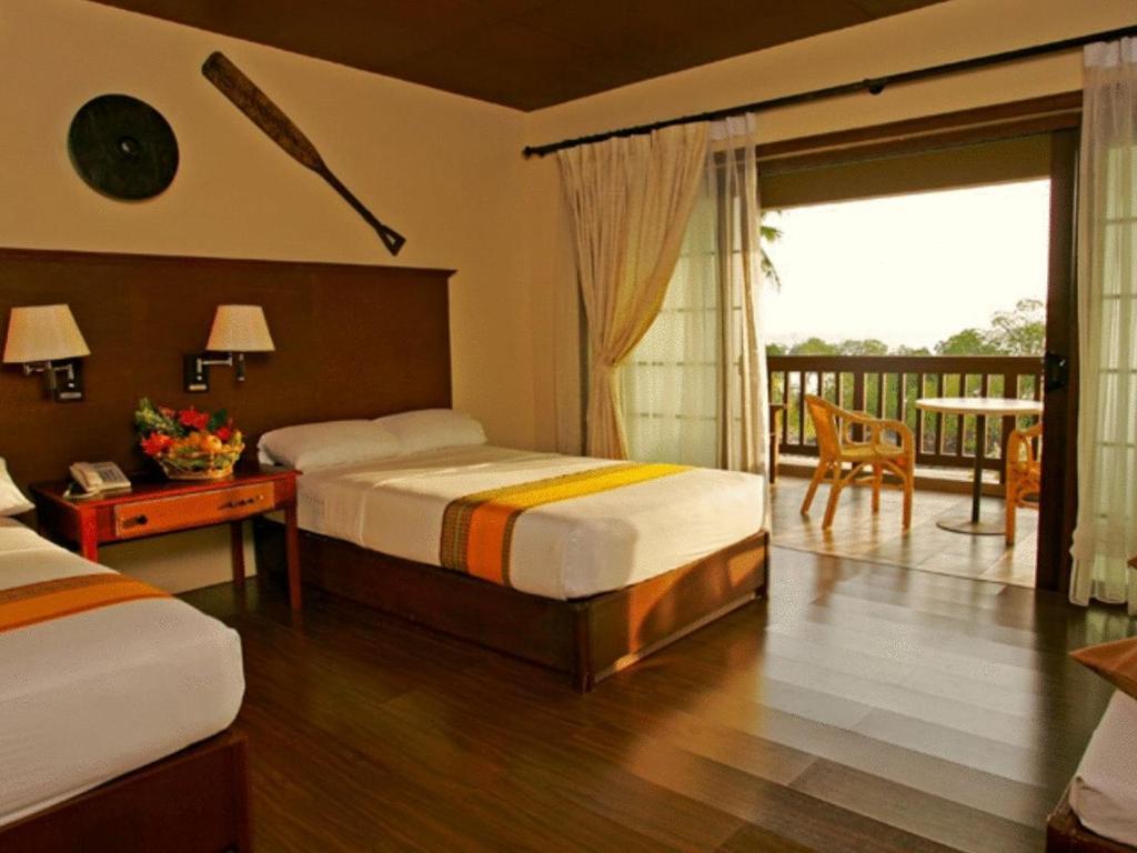 Dos Palmas Island Resort & Spa Puerto Princesa Habitación foto